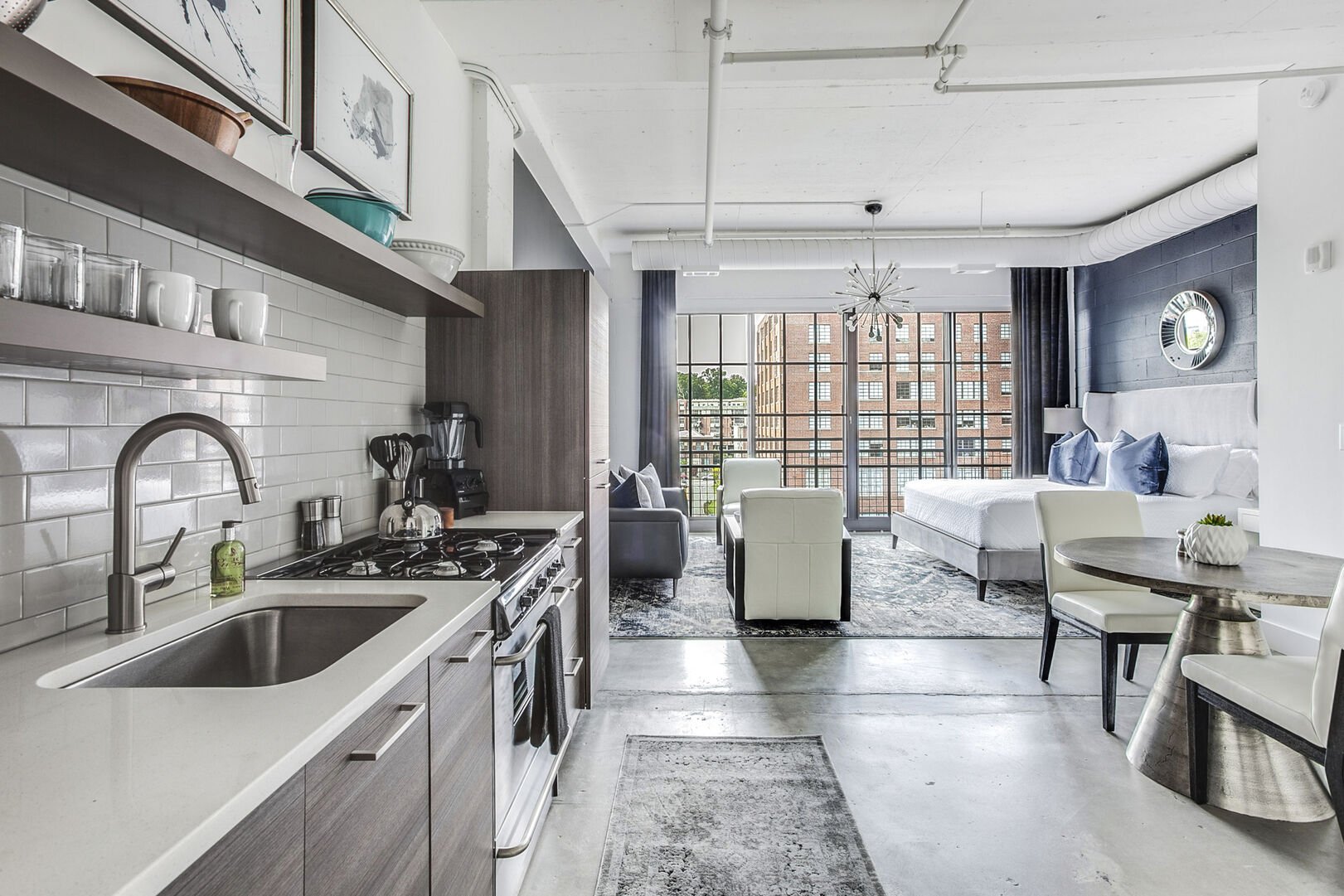 Picture was taken from inside the kitchen with a view of the living area and sleeping area. Picture was taken from inside the kitchen with a view of the living area and sleeping area.