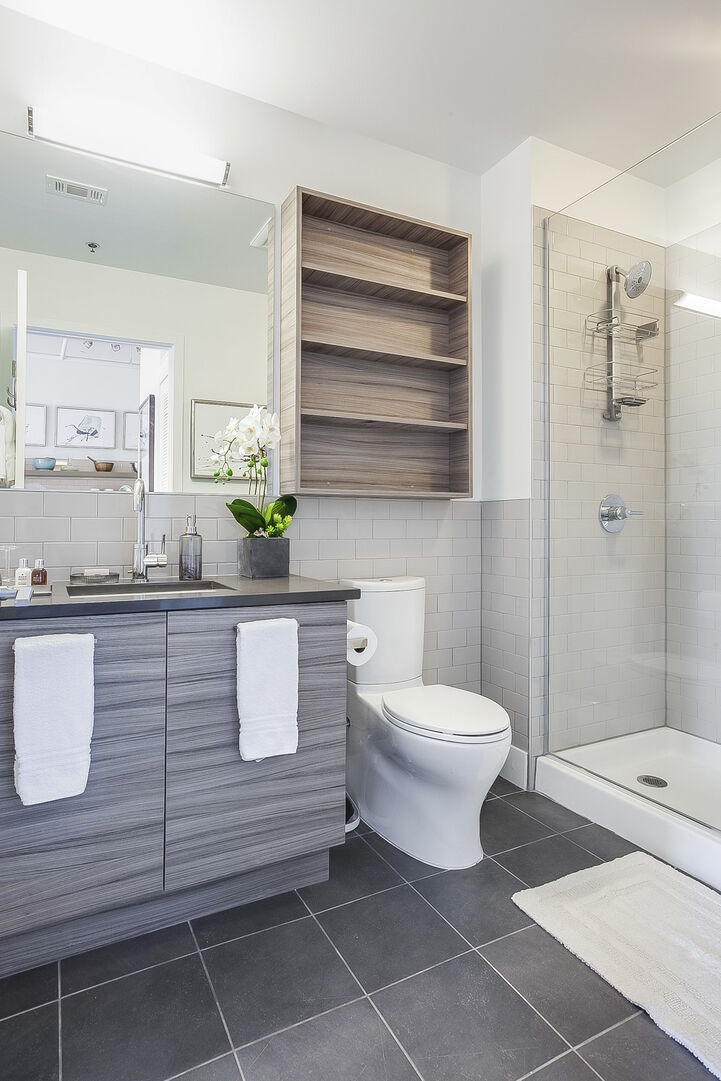 The bathroom of this Apartment Near Ponce City Market with vanity sink and walk-in shower. The bathroom of this Apartment Near Ponce City Market with vanity sink and walk-in shower.