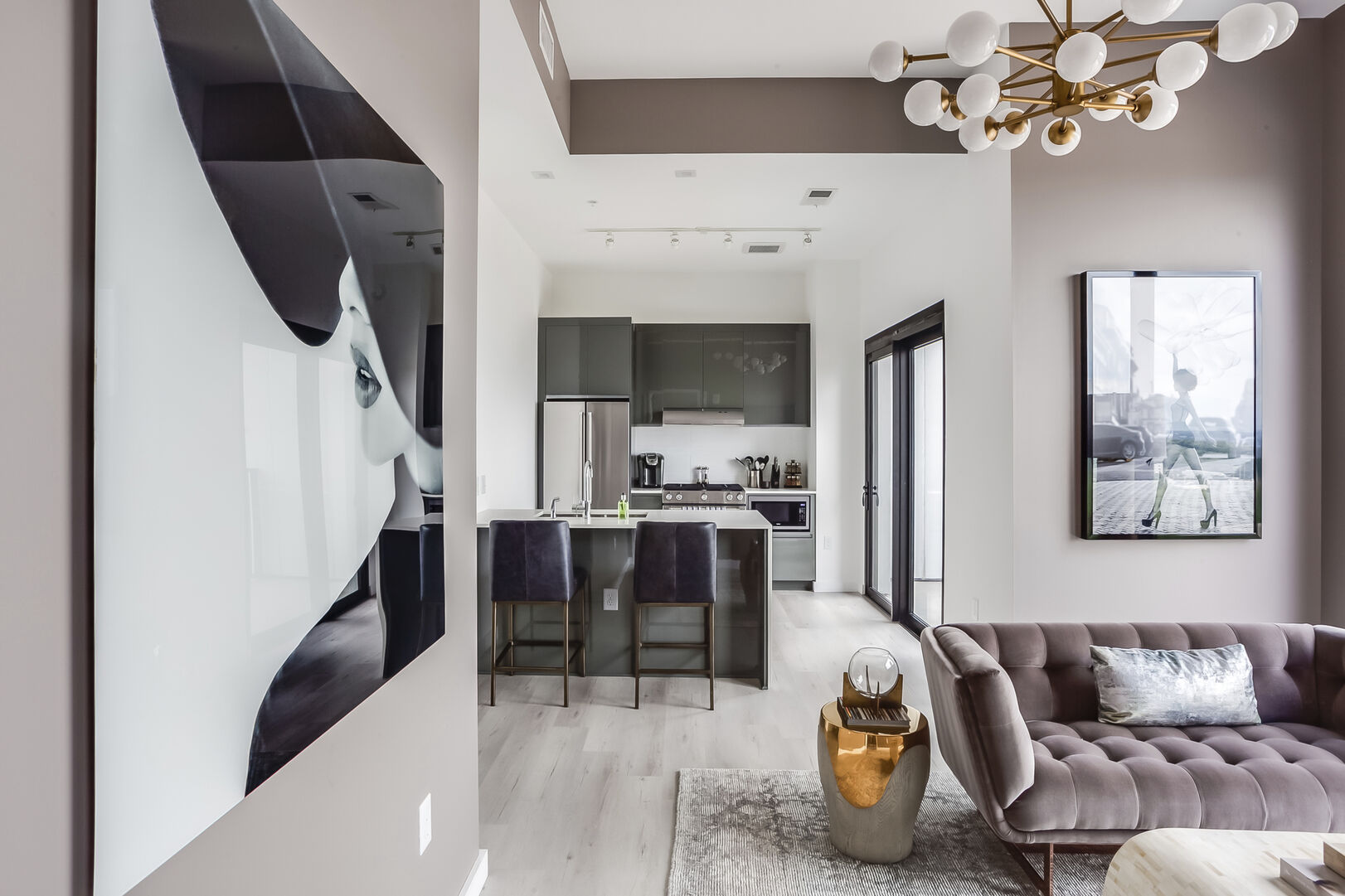 Living Area with Sofa and View into Kitchen