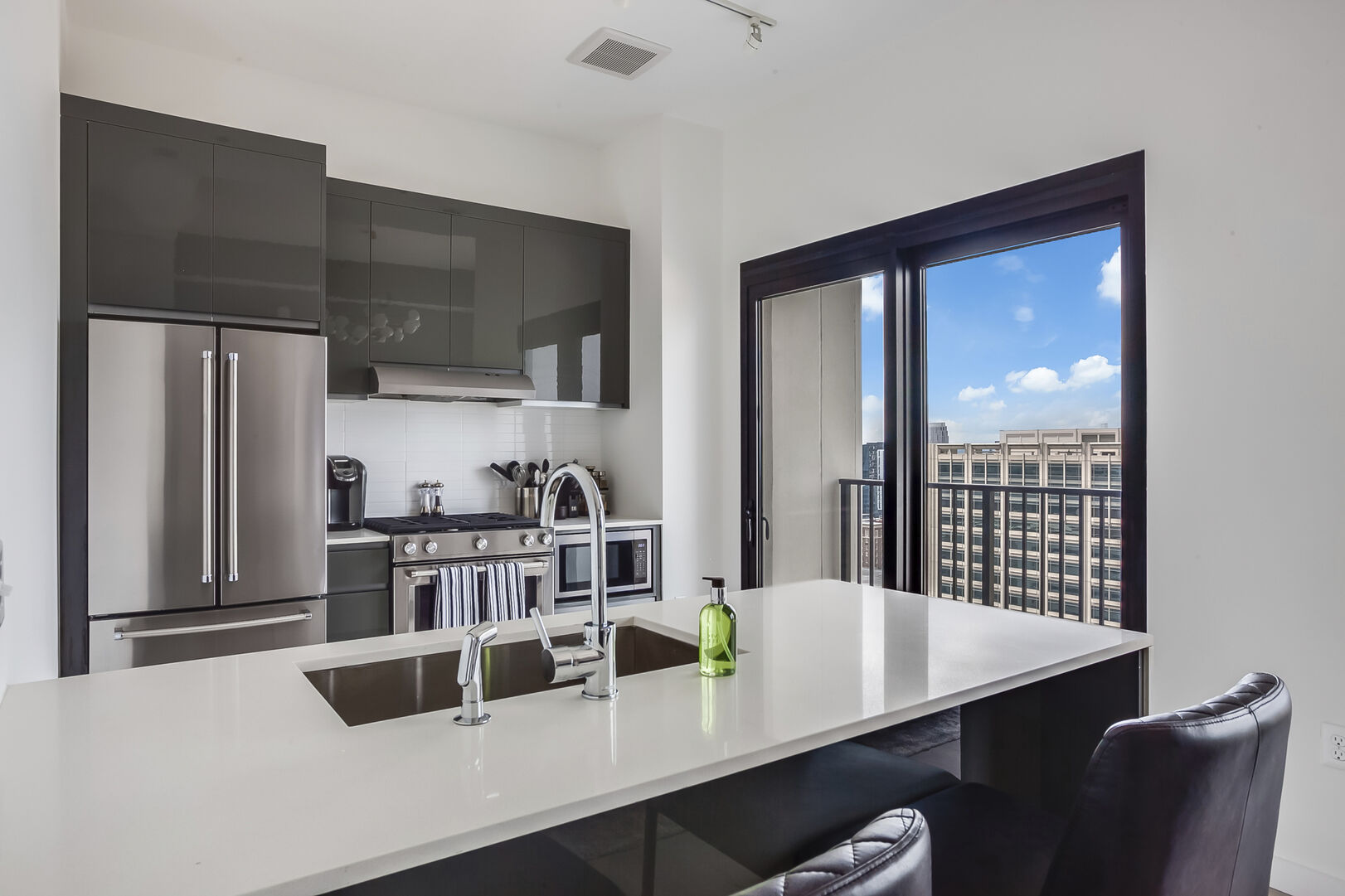 Fully Equipped Kitchen with Balcony Access