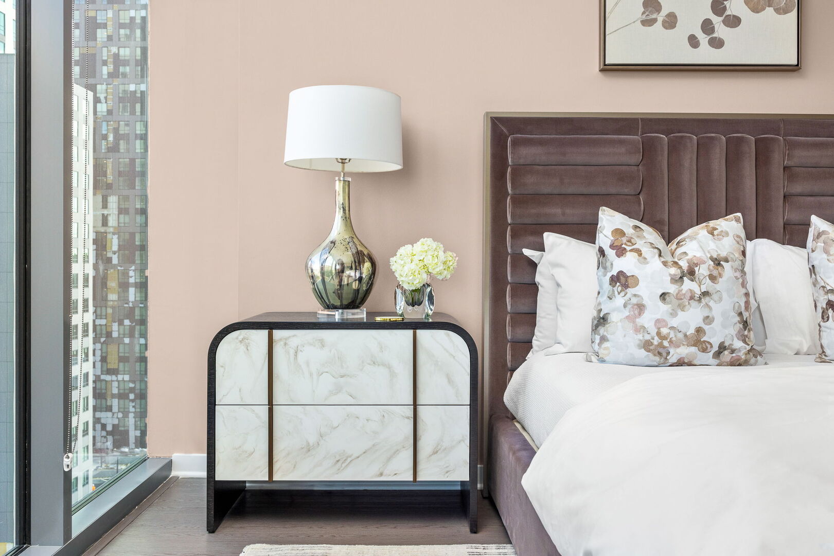 Primary suite with a queen king and a 55 4K UHD TV