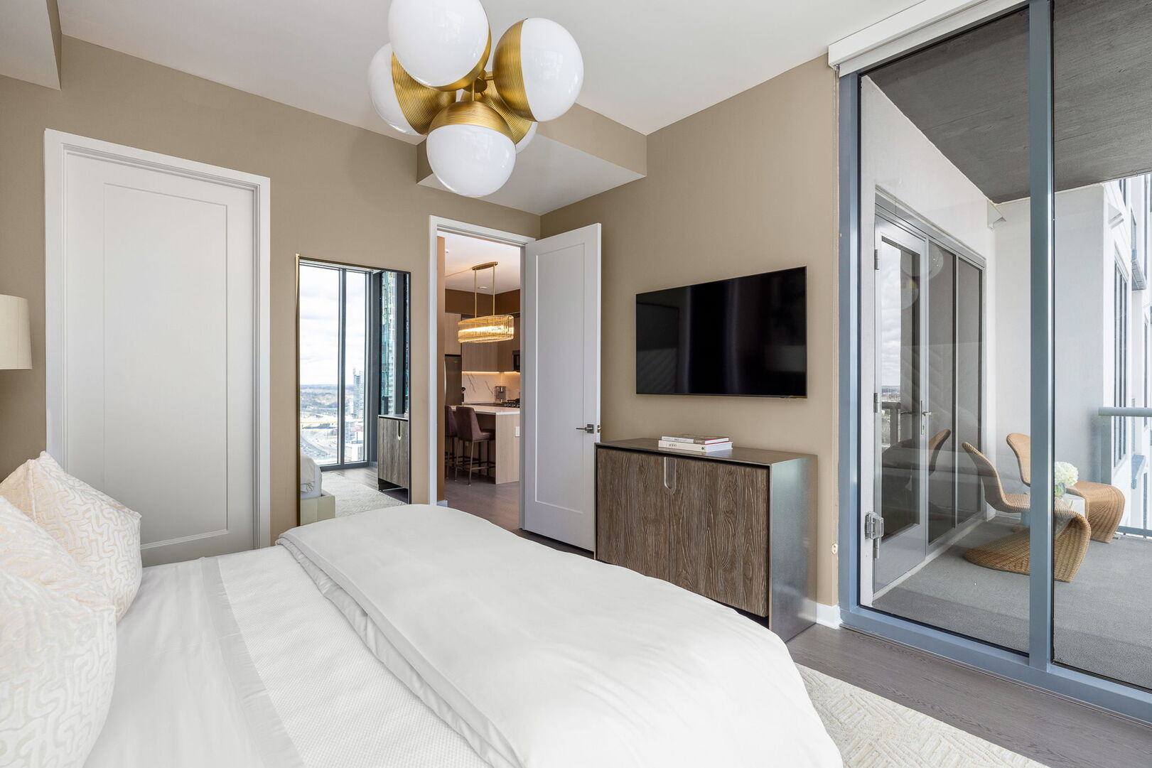 Primary suite with a king bed and a 55 4K UHD TV