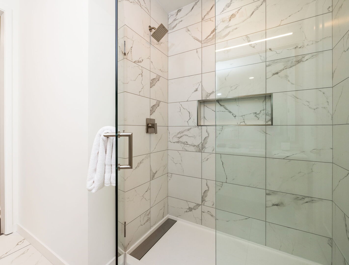 Spacious walk-in shower featuring Molton Brown amenities Spacious walk-in shower featuring Molton Brown amenities