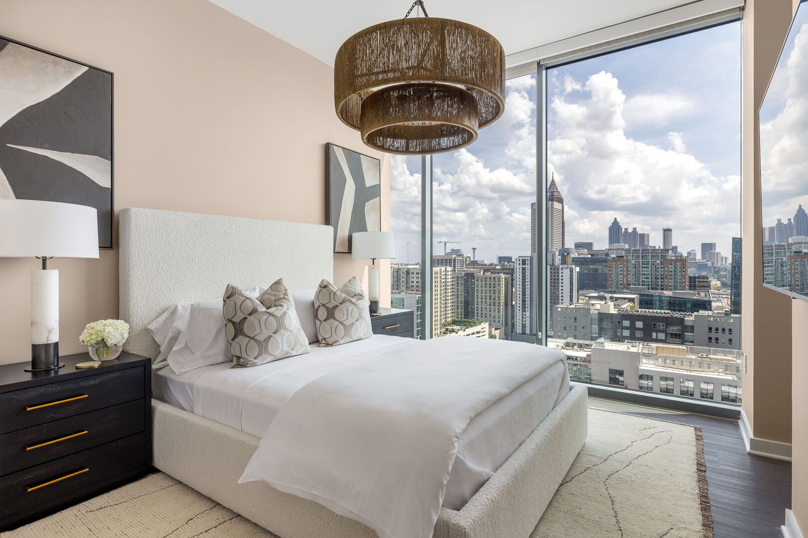 Secondary suite with a queen bed and a 55 Secondary suite with a queen bed and a 55