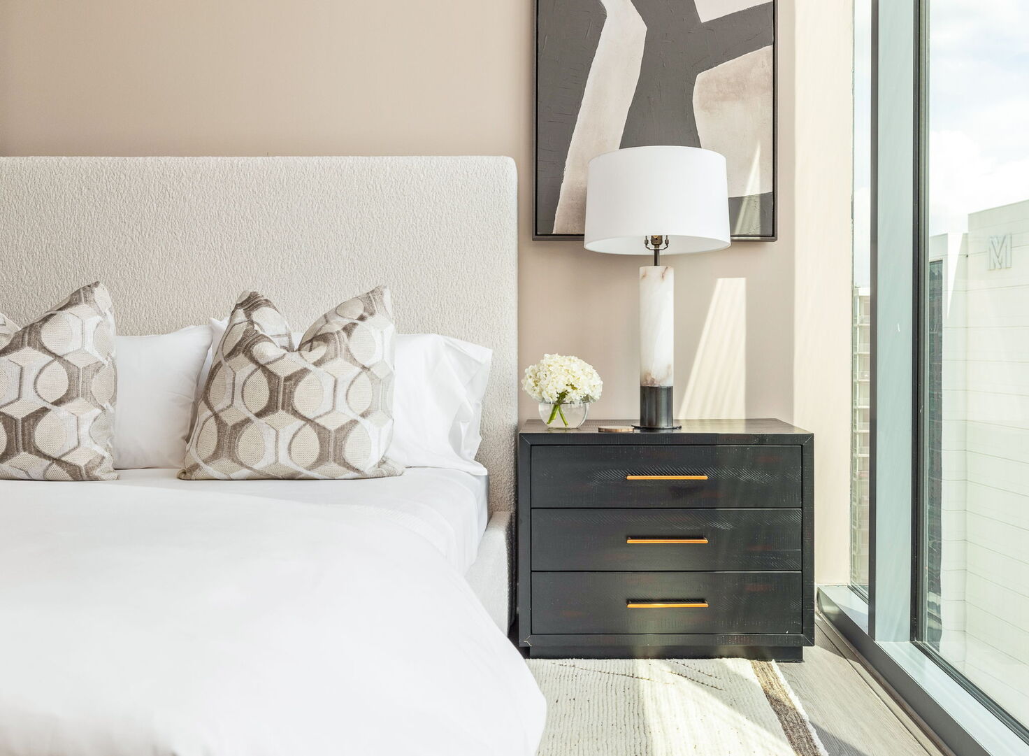 Secondary suite with a queen bed and a 55 Secondary suite with a queen bed and a 55