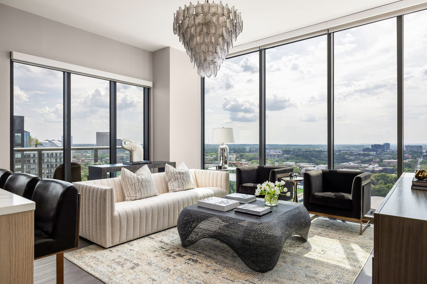 Living room featuring a 65 Living room featuring a 65