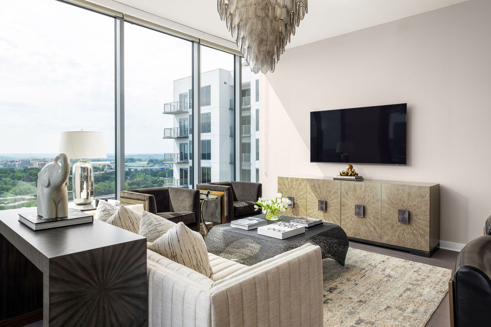 Living room featuring a 65 Living room featuring a 65