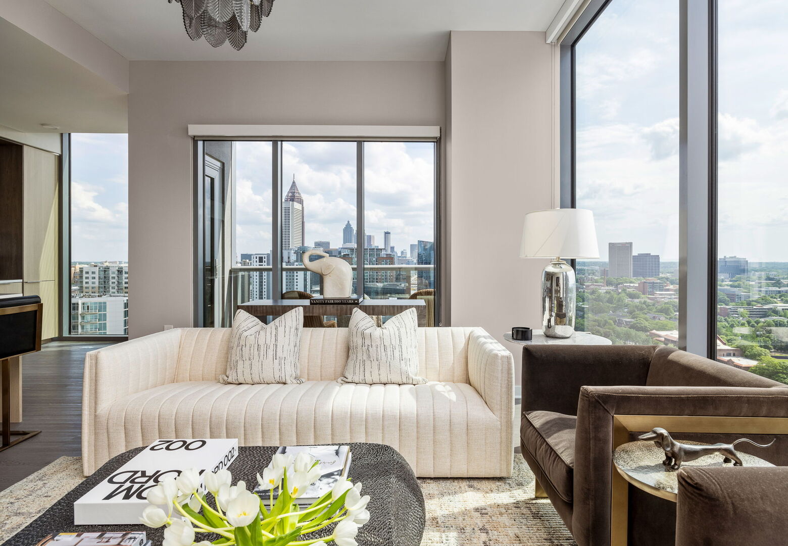 Living room featuring a 65 Living room featuring a 65