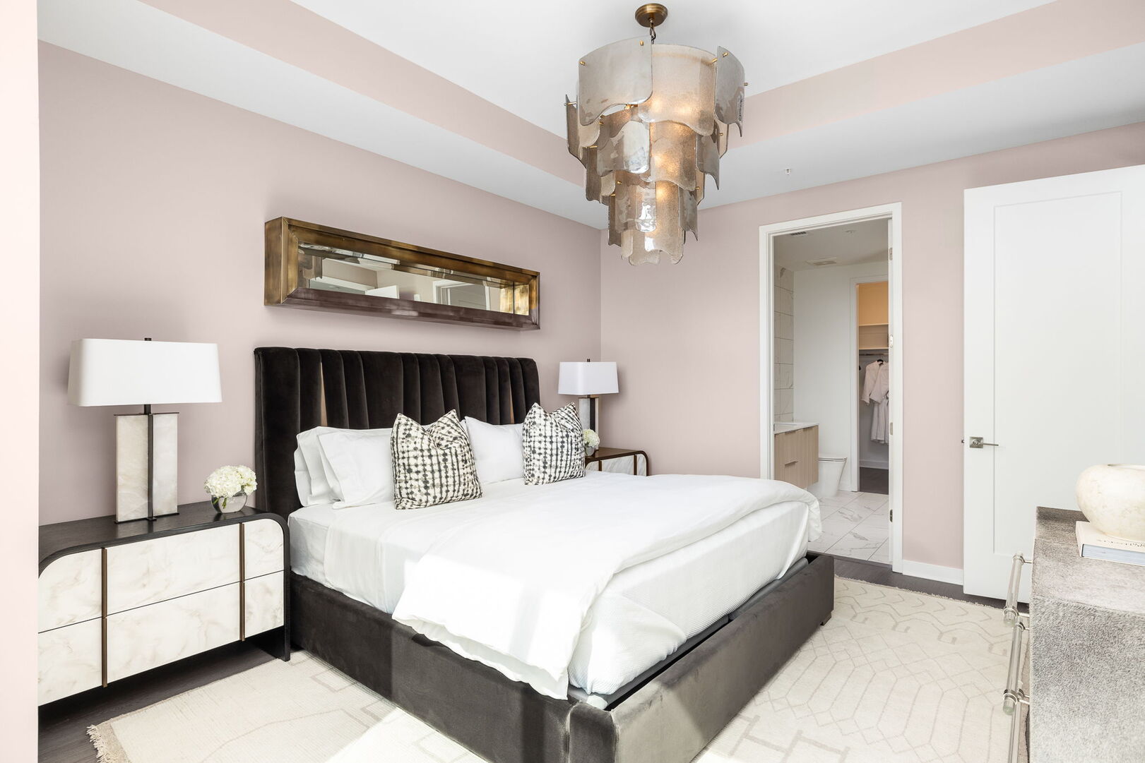 Primary suite with a king bed and a 55 Primary suite with a king bed and a 55