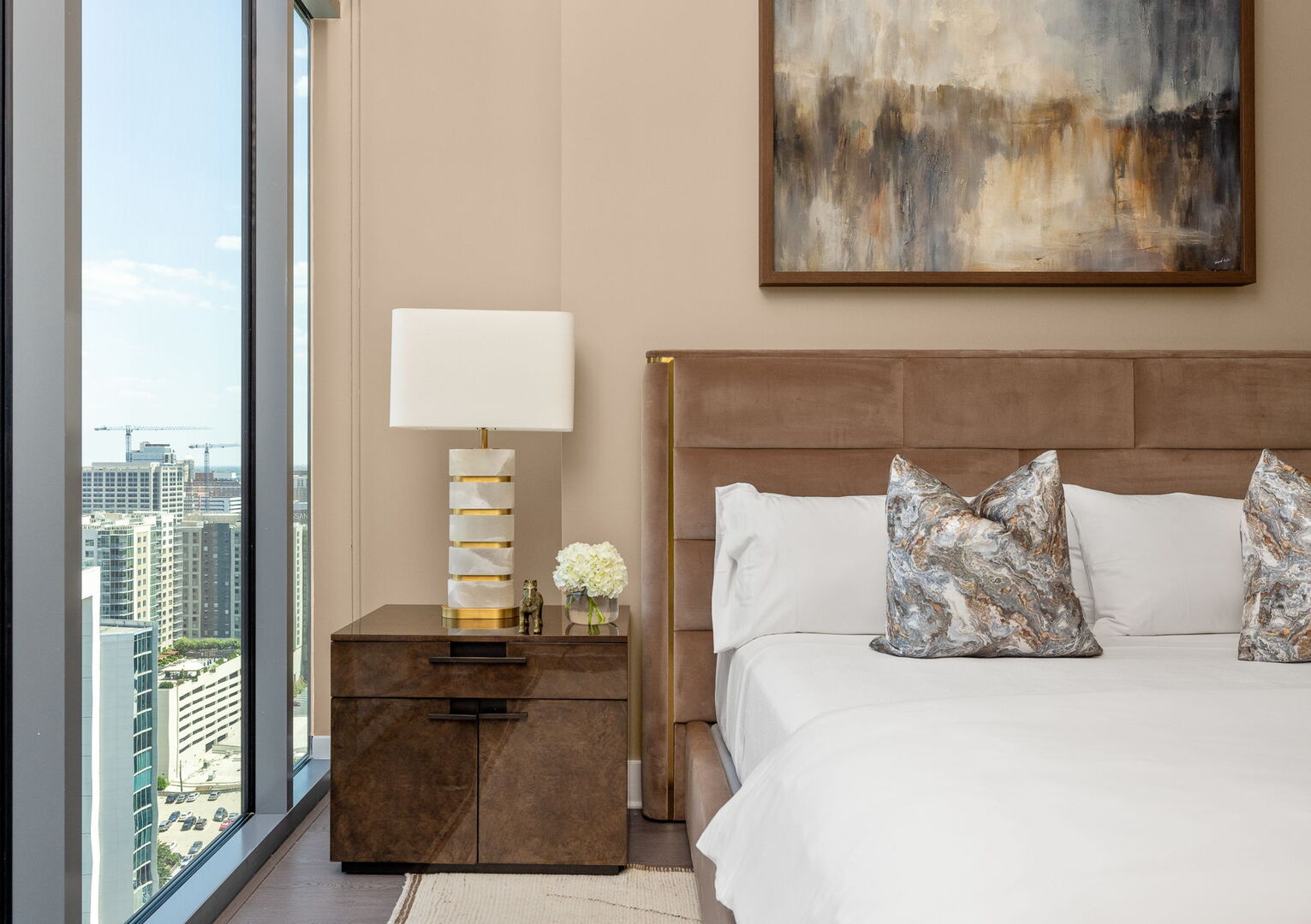 Primary suite with a king bed and a 55 Primary suite with a king bed and a 55