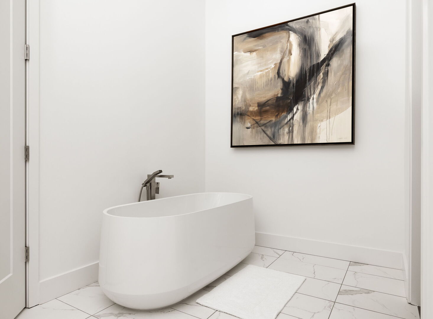 An en-suite bathroom featuring a double vanity and a spacious walk-in shower and a tub An en-suite bathroom featuring a double vanity and a spacious walk-in shower and a tub