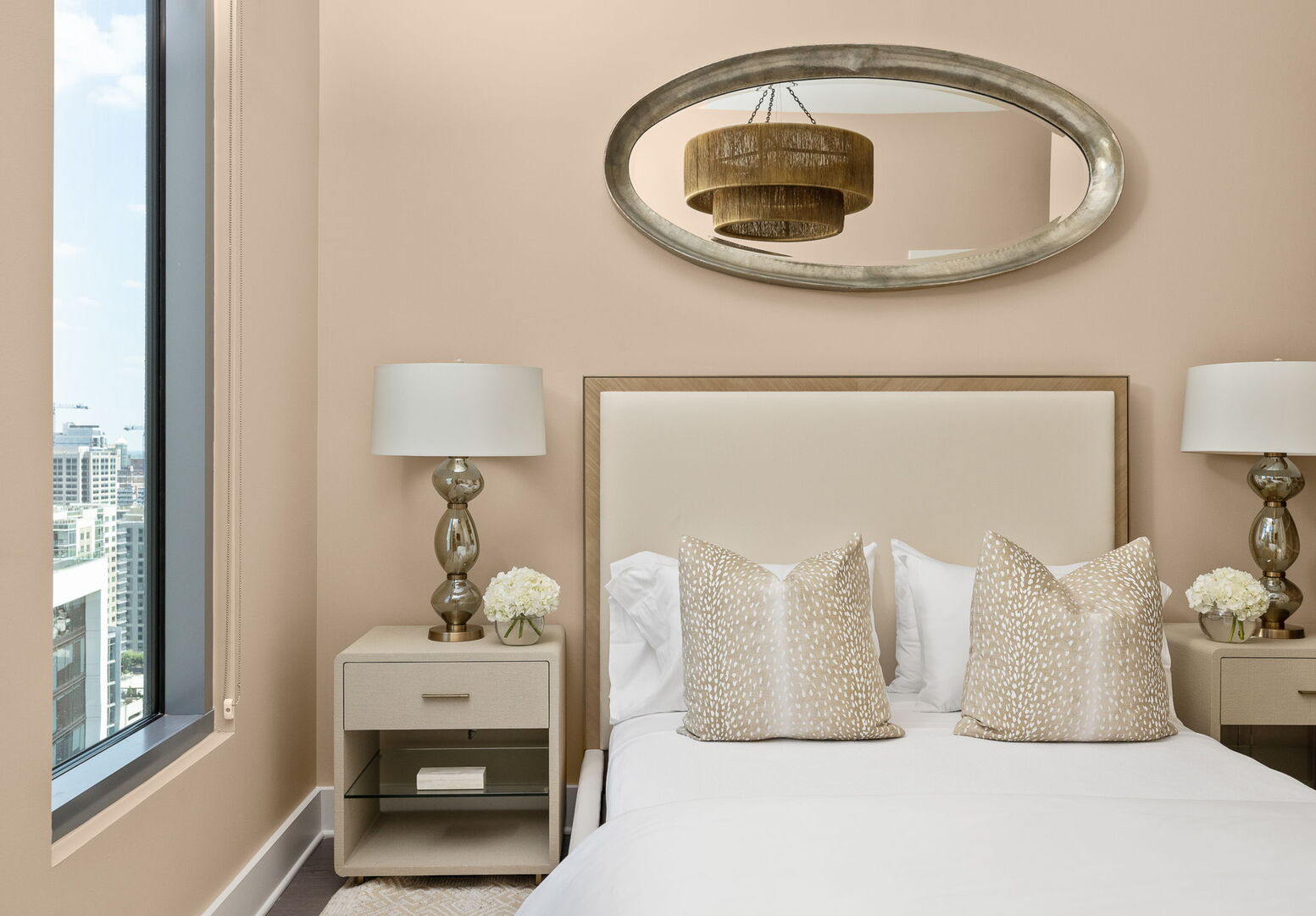 Guest suite with a queen bed and a 55 Guest suite with a queen bed and a 55