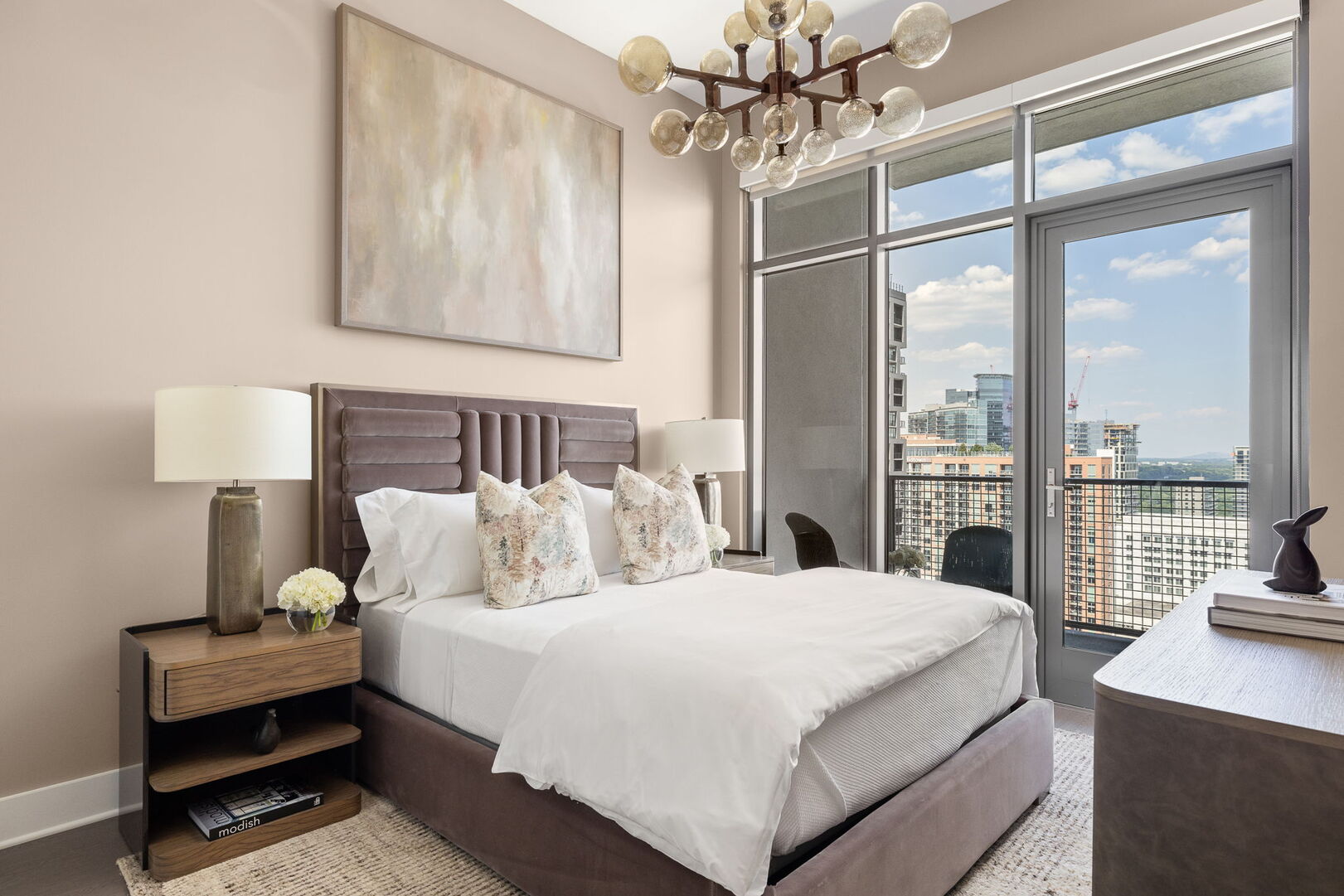 Guest suite with a queen bed and a 55 Guest suite with a queen bed and a 55