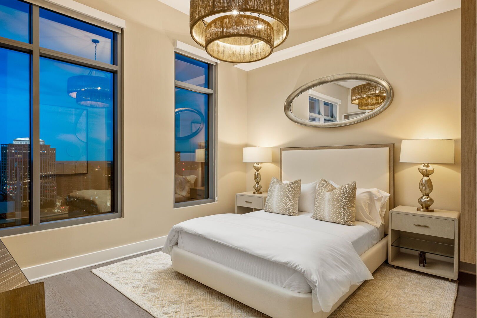 Guest suite with a queen bed and a 55 Guest suite with a queen bed and a 55