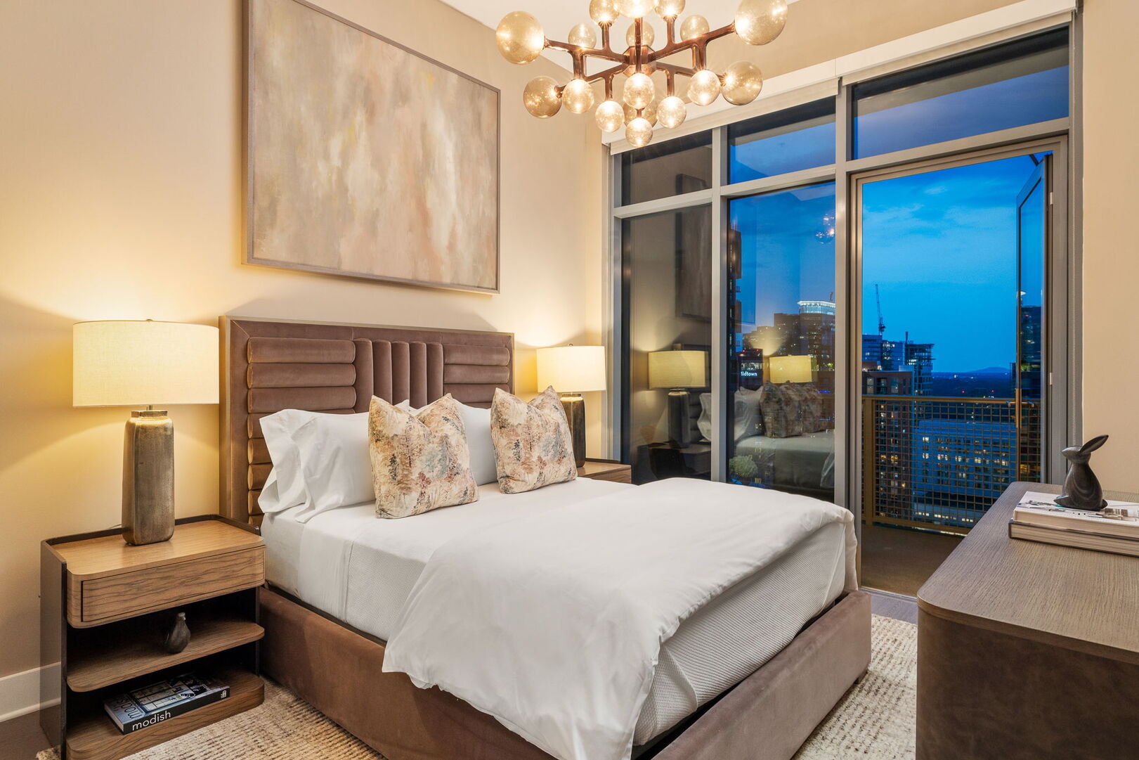 Guest suite with a queen bed and a 55 Guest suite with a queen bed and a 55