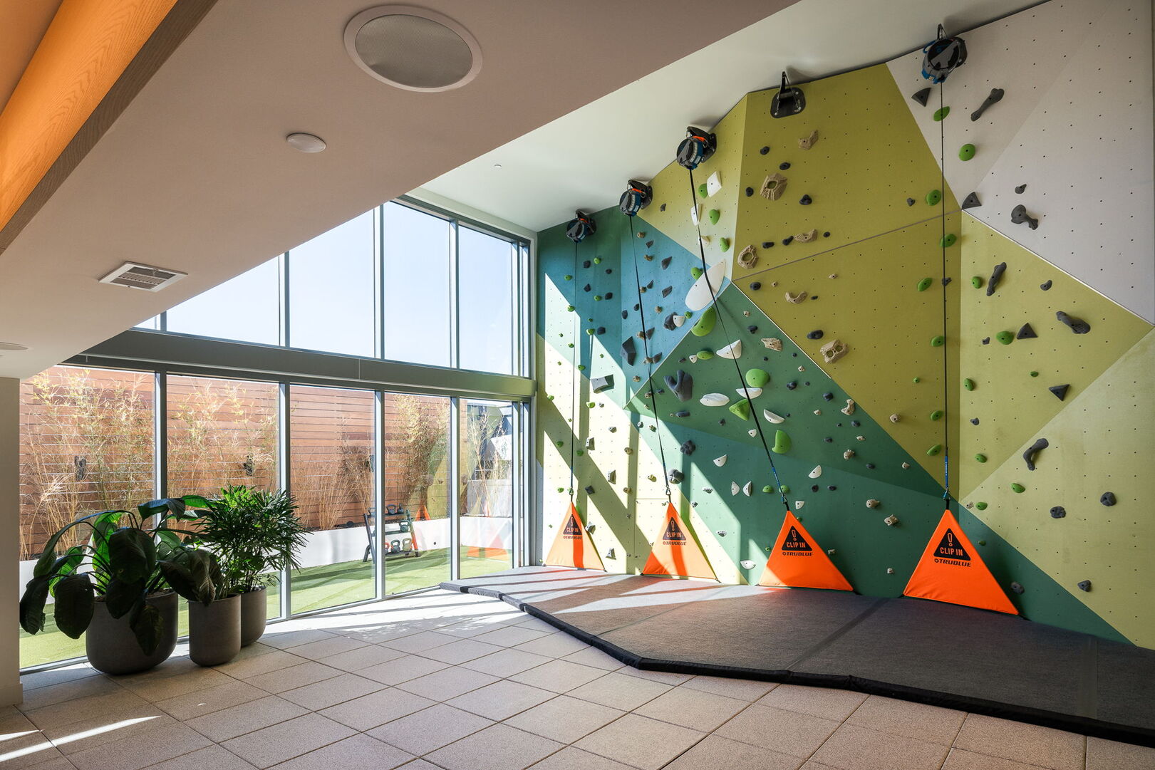 Fitness studio featuring a rock wall Fitness studio featuring a rock wall
