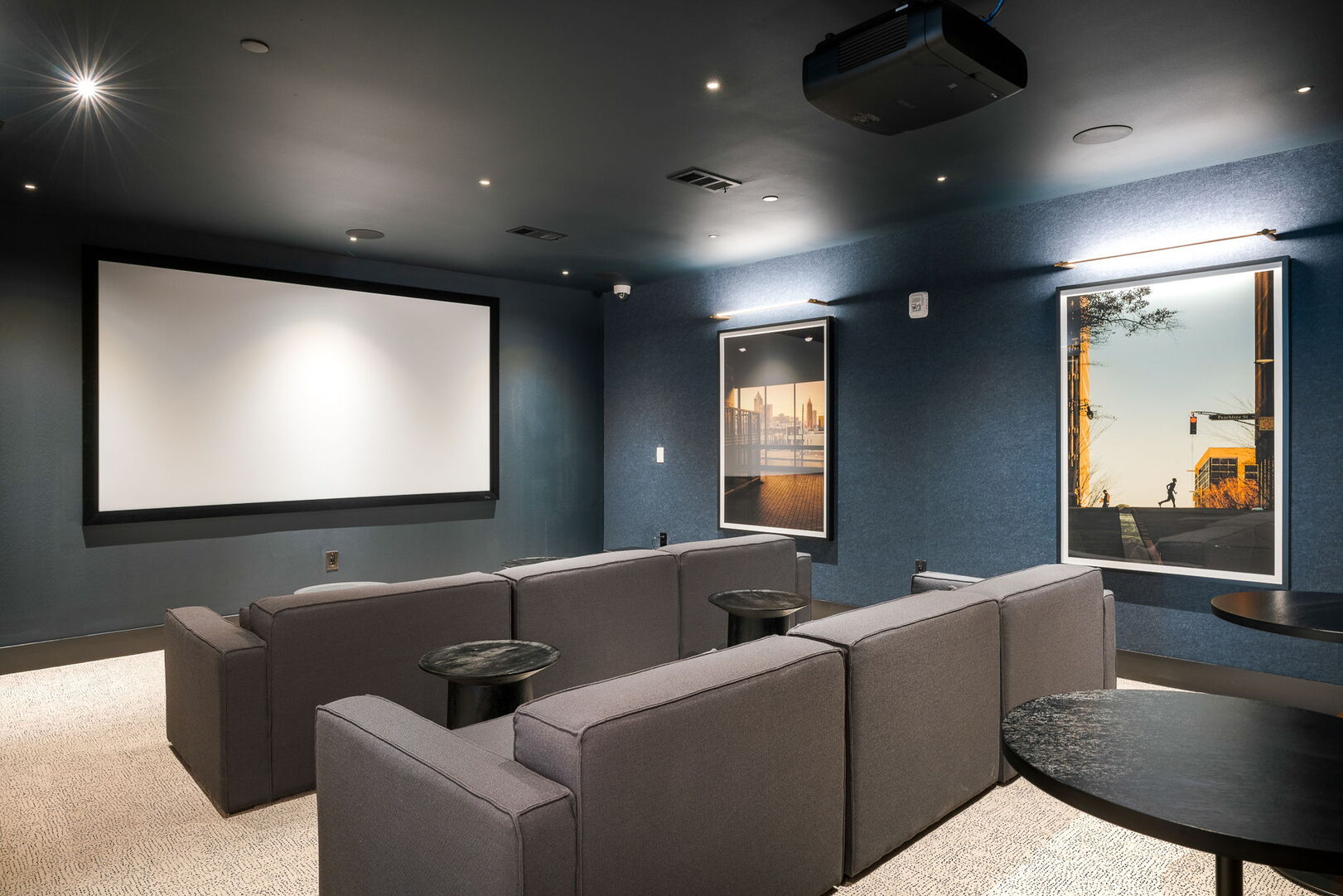 Elegant screening room equipped with plush seating, a high-definition projector, and state-of-the-art sound system for a cinematic experience at home. Ideal for movie nights and presentations Elegant screening room equipped with plush seating, a high-definition projector, and state-of-the-art sound system for a cinematic experience at home. Ideal for movie nights and presentations