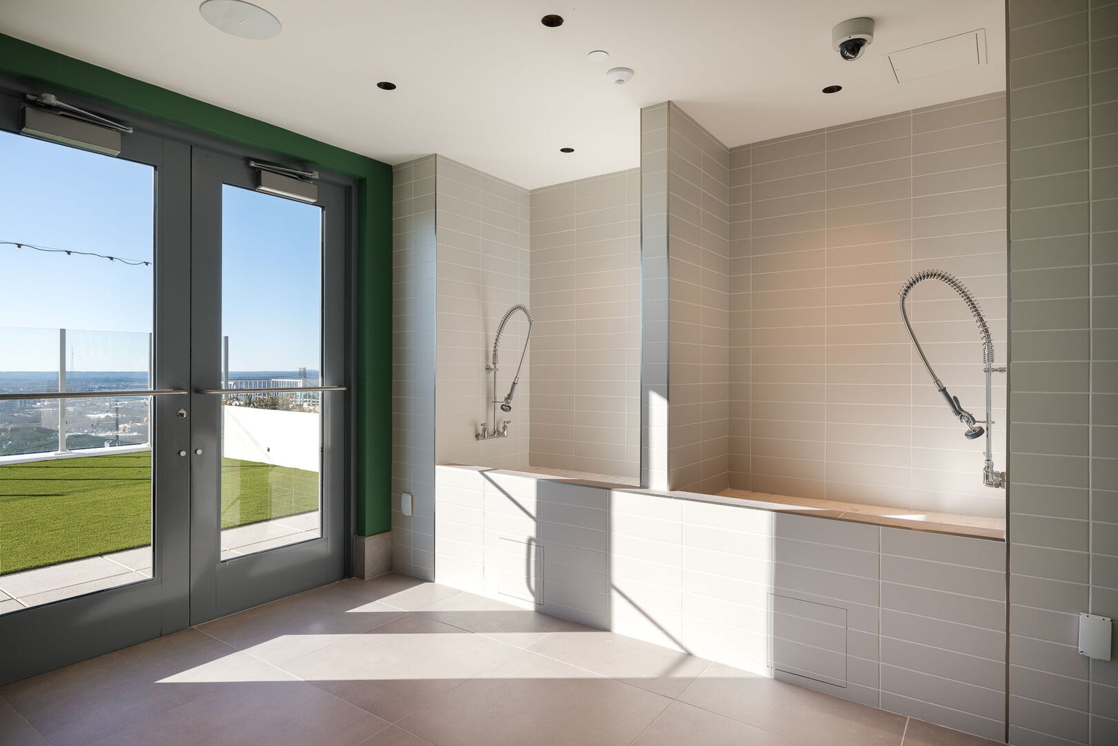 Dog wash station and dedicated dog walking area Dog wash station and dedicated dog walking area