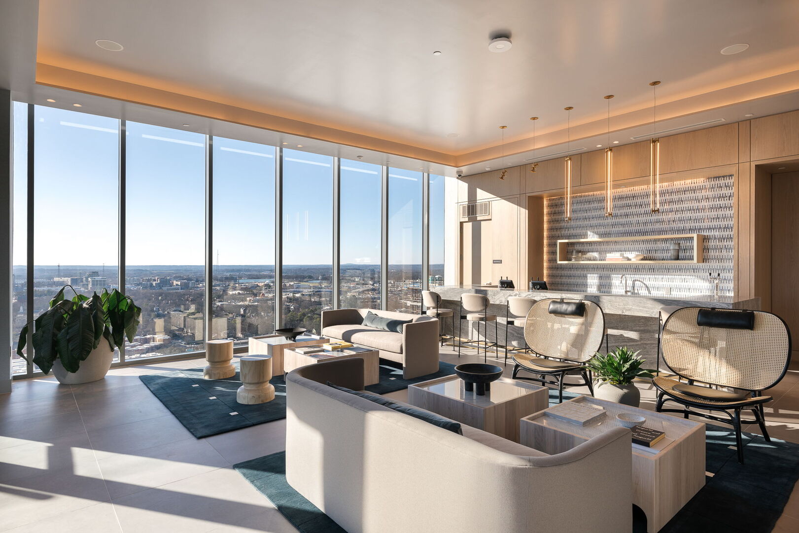 Sky deck lounge area with a bar and comfortable, lush seating Sky deck lounge area with a bar and comfortable, lush seating