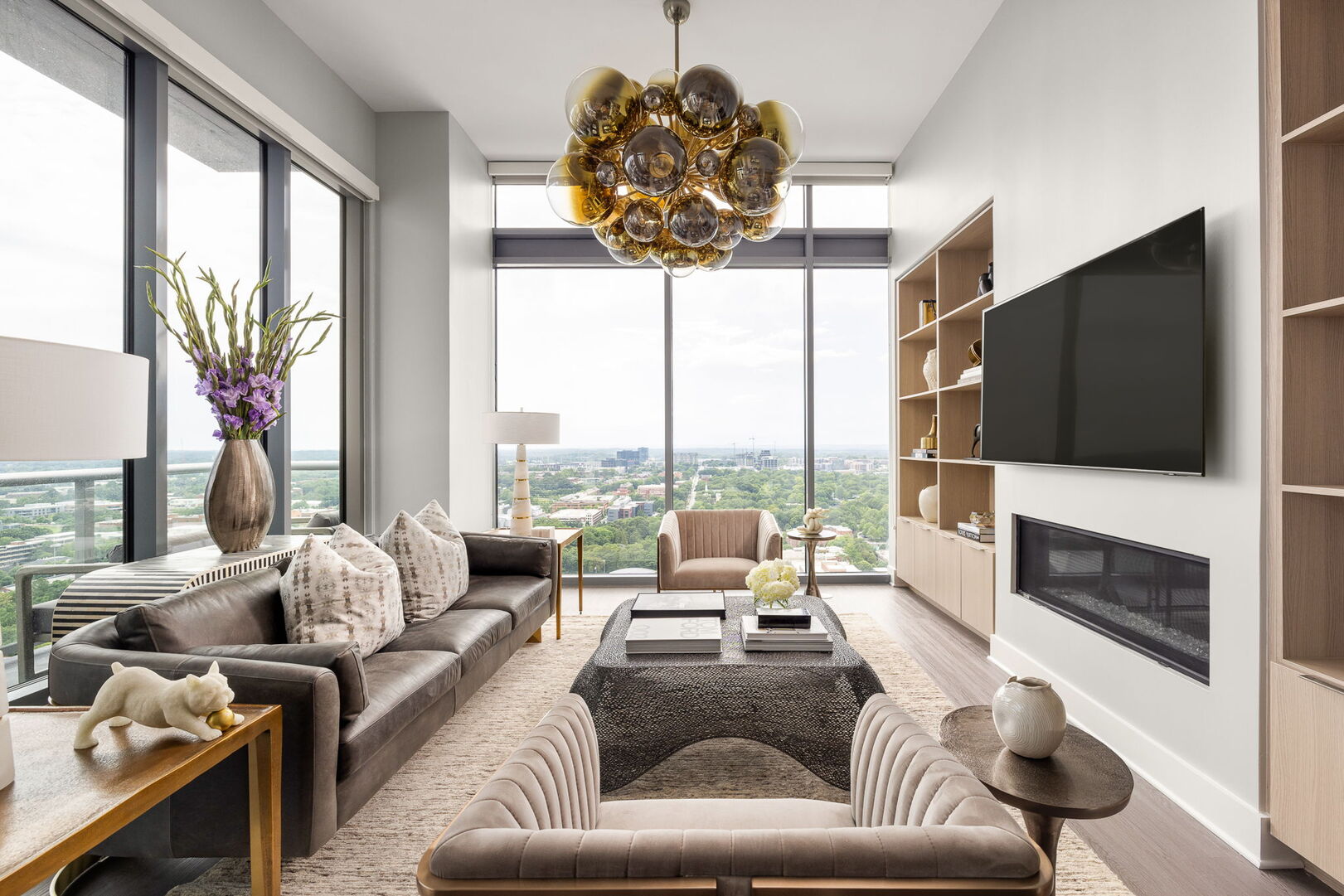 Living room featuring a 65 4K UHD TV