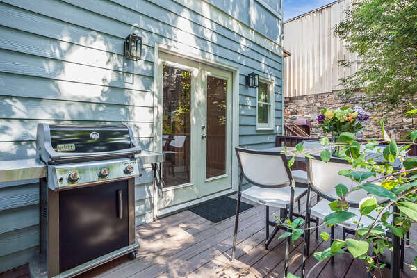 BBQ Grill, Outdoor Dining Table, and Chairs in the Backyard Deck.