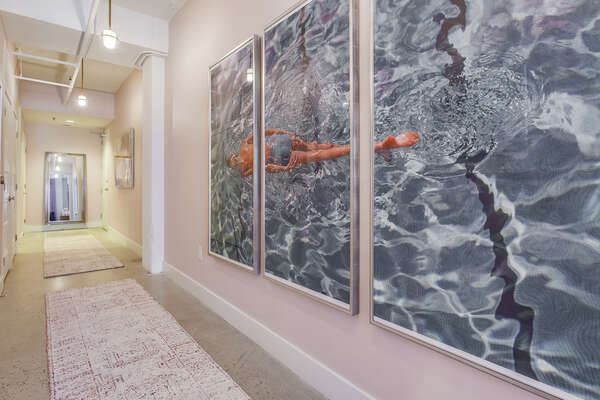 Hallway in Downtown Atlanta Rental Features Art Work.