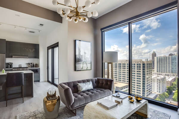 Living Area with Sofa and View into Kitchen