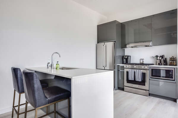 Fully Equipped Kitchen with Counter Seating for Two