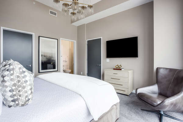 Bedroom with King Bed, TV, and Dresser