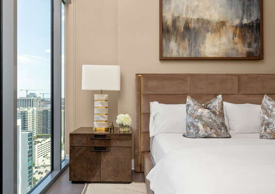 Primary suite with a king bed and a 55 4K UHD TV