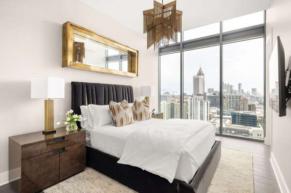 Guest suite with a queen bed and a 55 4K UHD TV